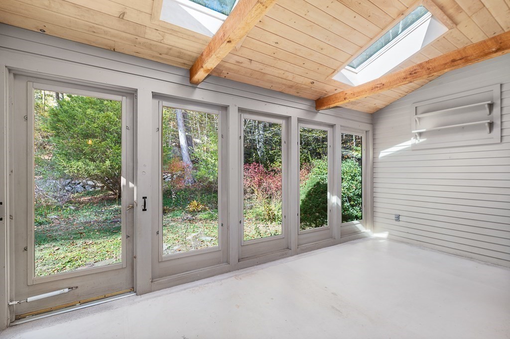 10 Hidden Ledge Road Manchester, MA 01944 - Photo 7 of 40 a view of backyard with green space