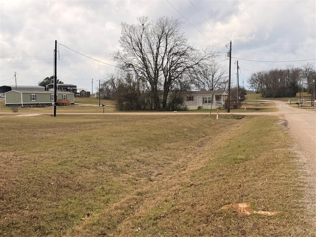 0 Waterfront Row Quitman, TX 75783 - Photo 12 of 21 a view of ocean with a palm tree