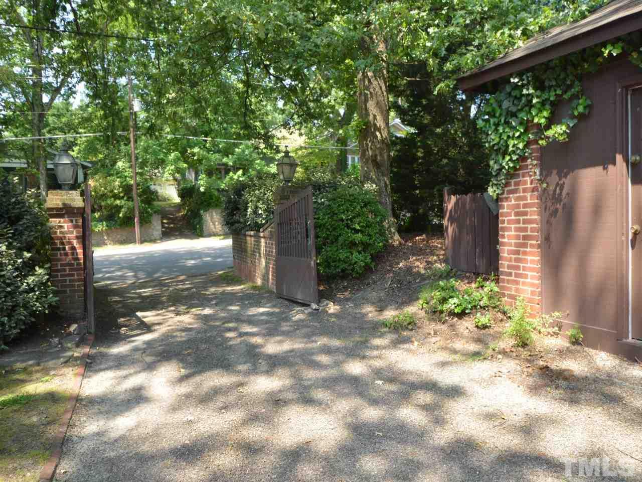 2201 Beechridge Road Raleigh, NC 27608 - Photo 22 of 23 a view of a pathway of a yard