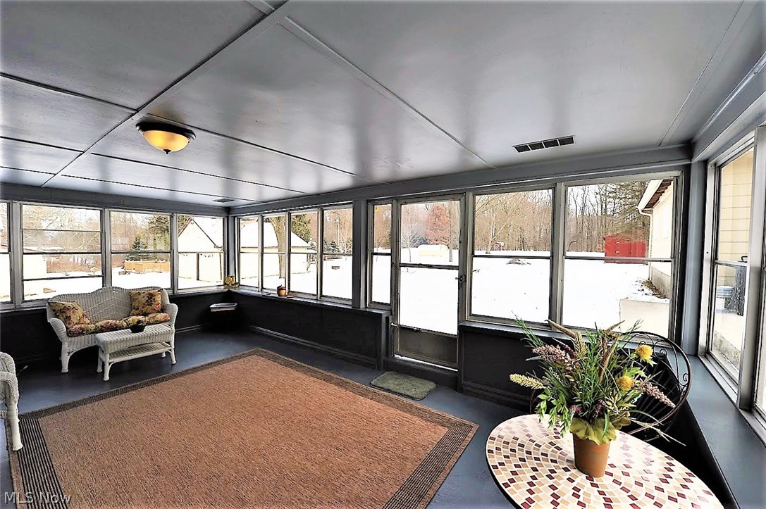 * Beautiful Sunroom/Enclosed Porch On The Back Of The Home! ~