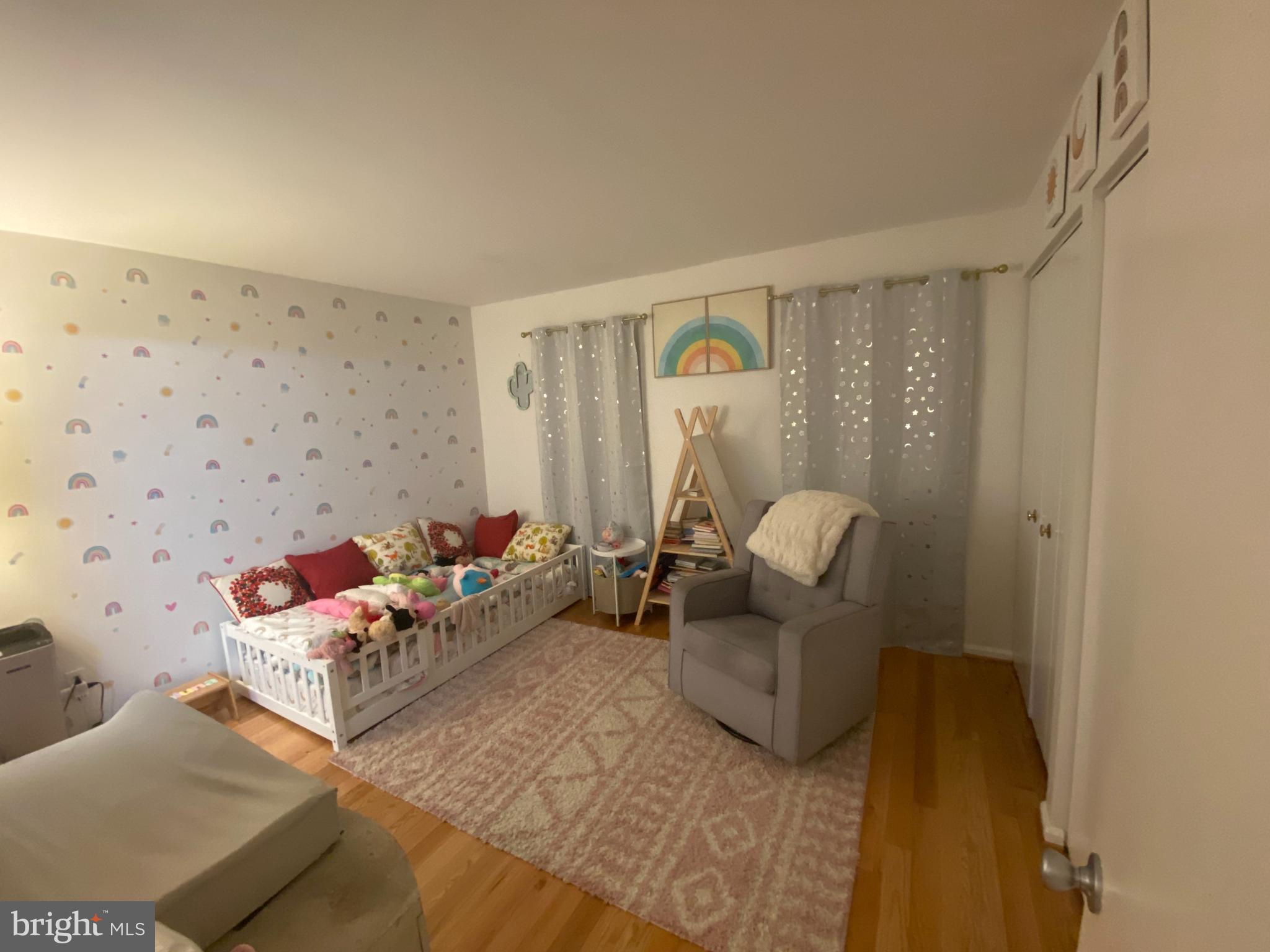 8523 Gambel Oak Drive Springfield, VA 22153 - Photo 22 of 41 a living room with furniture and a fireplace