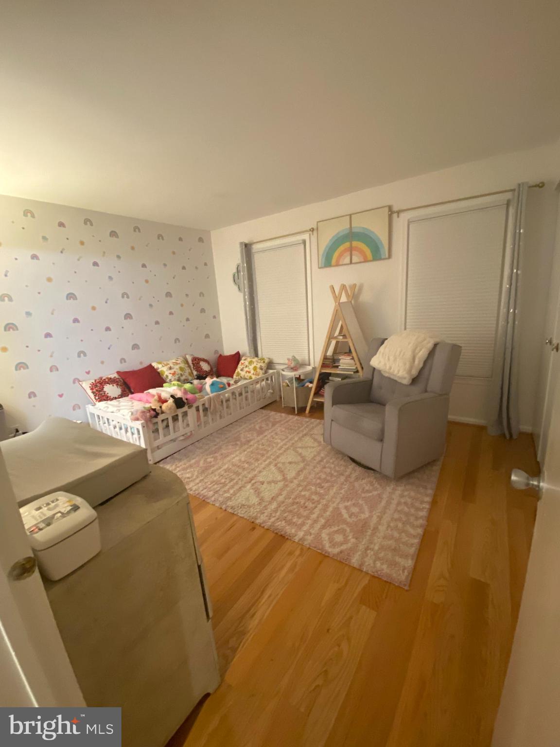 8523 Gambel Oak Drive Springfield, VA 22153 - Photo 24 of 41 a bedroom with a bed and gym equipment