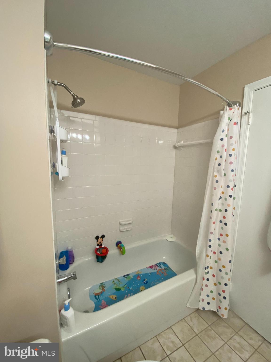 8523 Gambel Oak Drive Springfield, VA 22153 - Photo 25 of 41 a bathroom with a shower and a bath tub