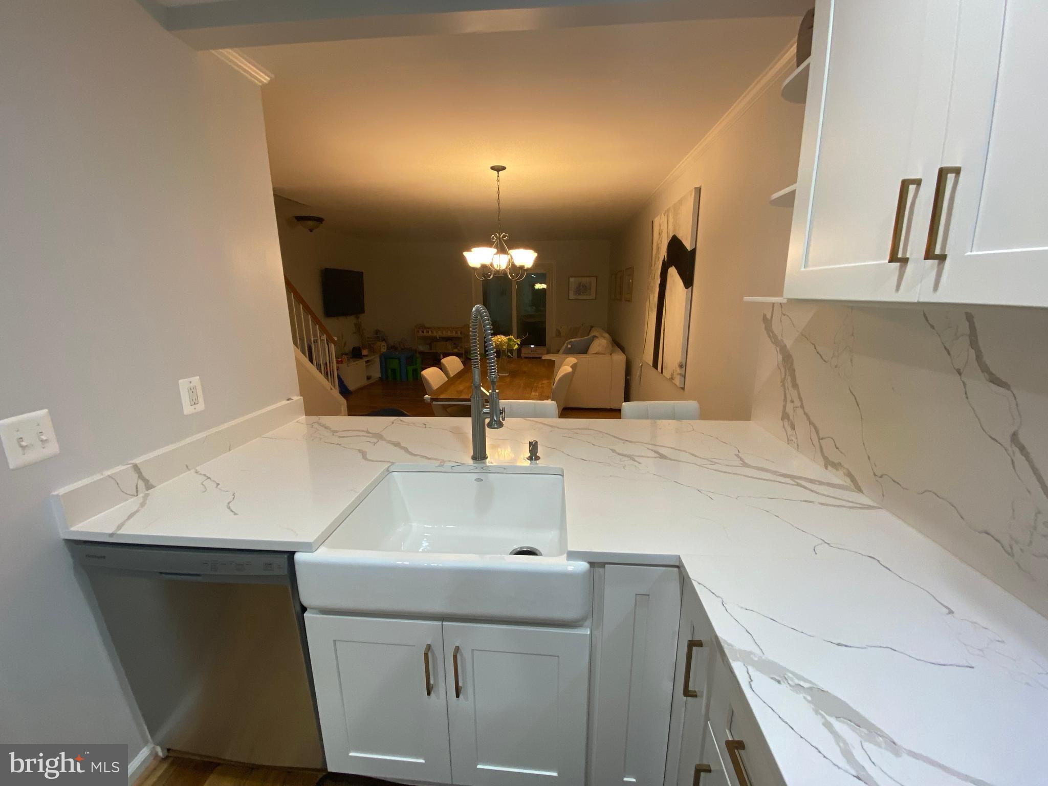 8523 Gambel Oak Drive Springfield, VA 22153 - Photo 34 of 41 a bathroom with a sink and a mirror