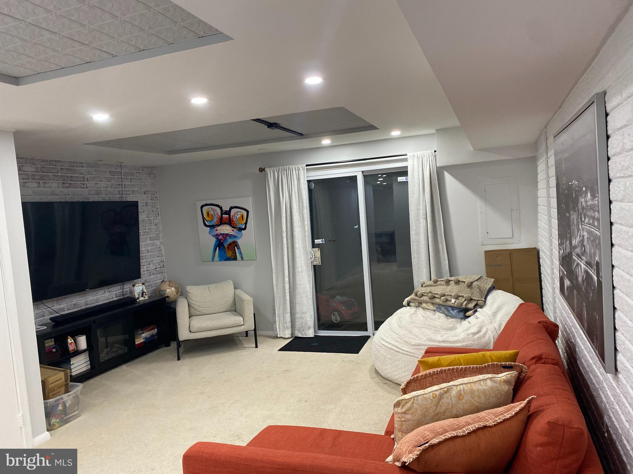 8523 Gambel Oak Drive Springfield, VA 22153 - Photo 7 of 41 a bedroom with furniture and a flat screen tv