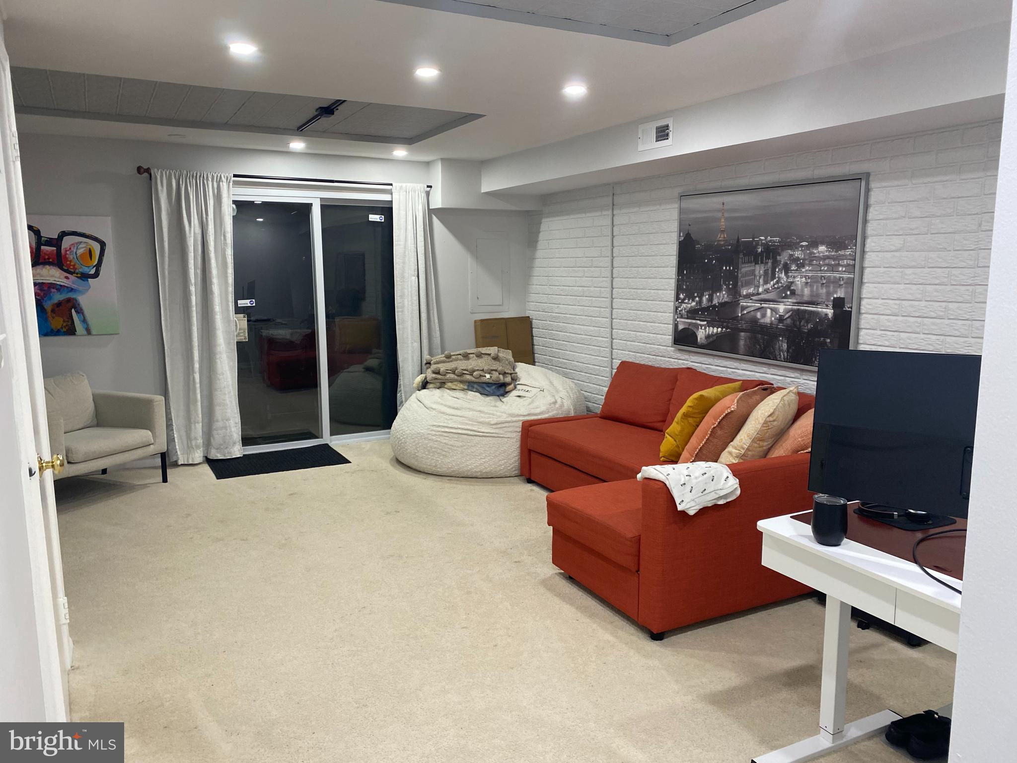 8523 Gambel Oak Drive Springfield, VA 22153 - Photo 10 of 41 a outdoor living space with furniture and a potted plant