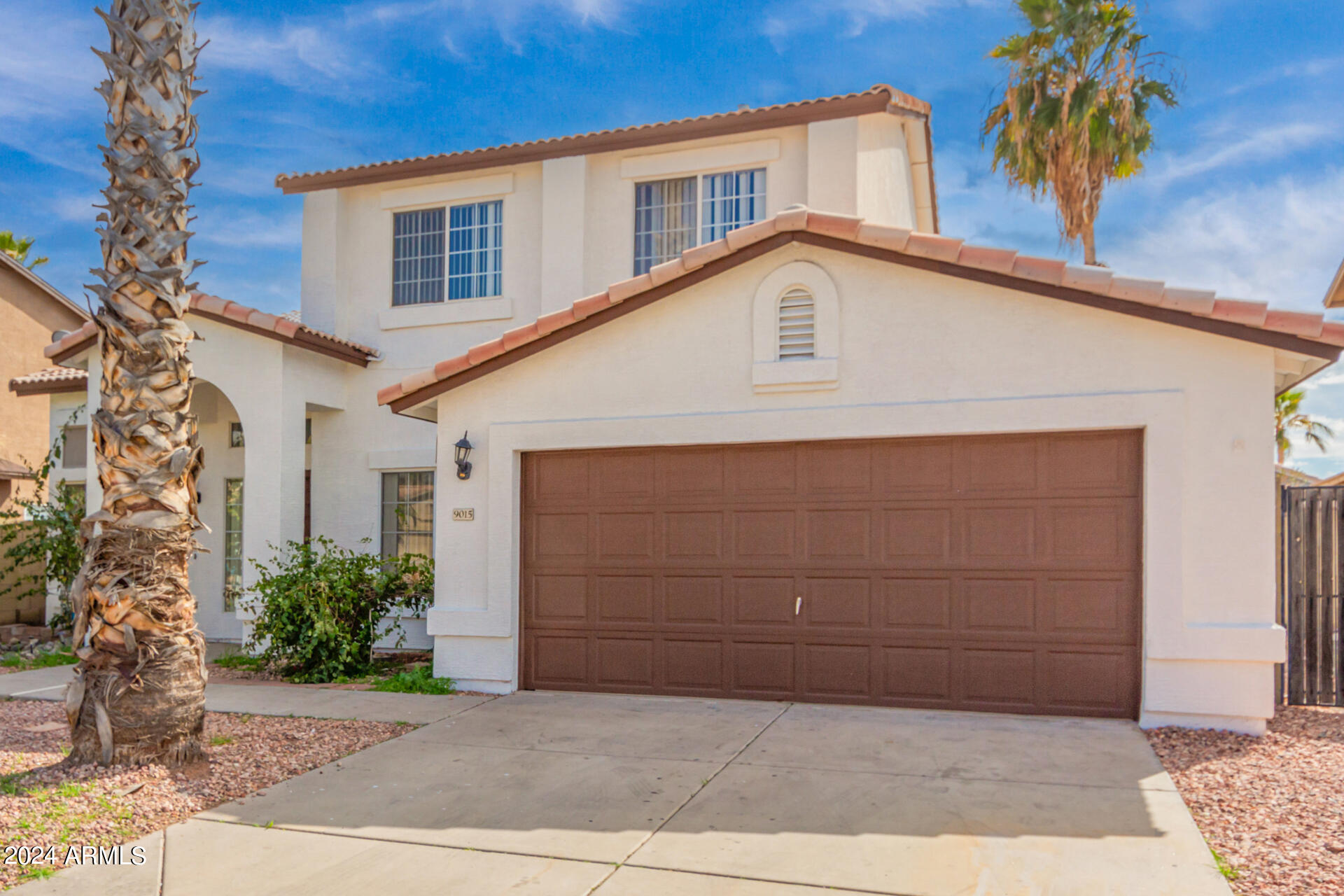 9015 West Monte Vista Road Phoenix, AZ 85037 - Photo 1 of 40 Front
