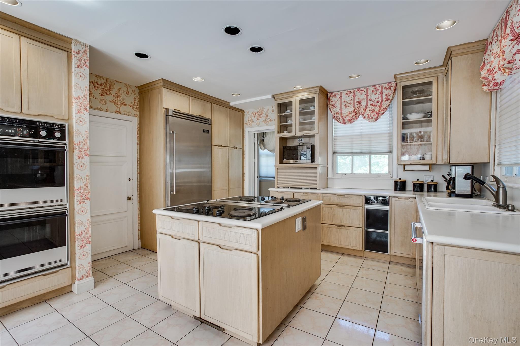274 River Road St. James, NY 11780 - Photo 12 of 30 a kitchen with a stove sink and refrigerator