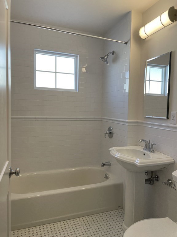 55 Dalton Road, Unit 1 Belmont, MA 02478 - Photo 15 of 16 a bathroom with a sink toilet and shower
