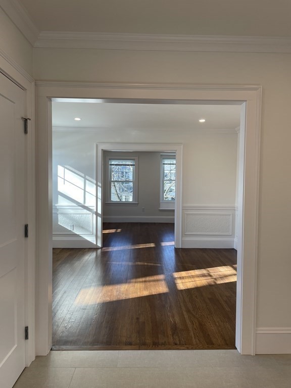 55 Dalton Road, Unit 1 Belmont, MA 02478 - Photo 7 of 16 a view of livingroom with hardwood floor and window