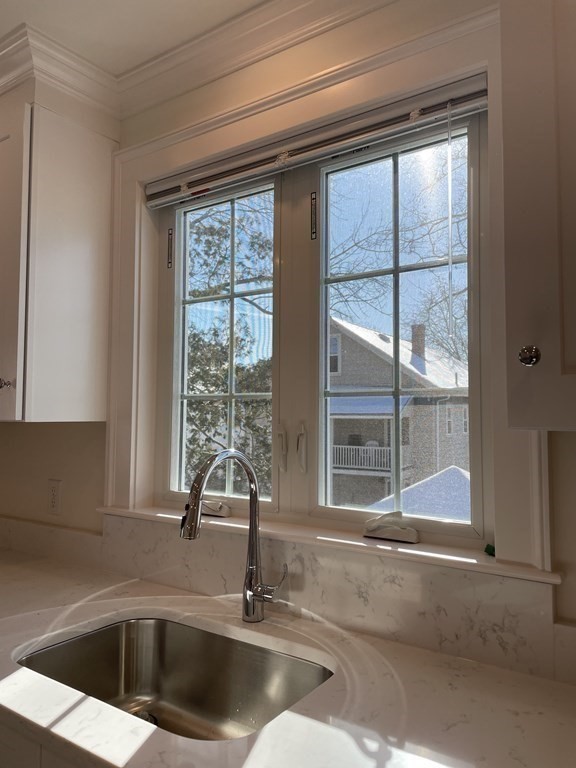 55 Dalton Road, Unit 1 Belmont, MA 02478 - Photo 10 of 16 a kitchen with a sink and a window