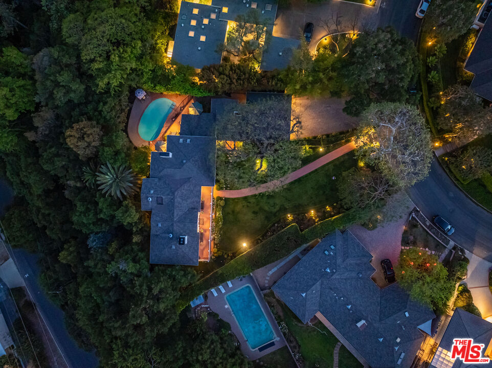 685 Elkins Road Los Angeles, CA 90049 - Photo 23 of 24 an aerial view of house with a yard