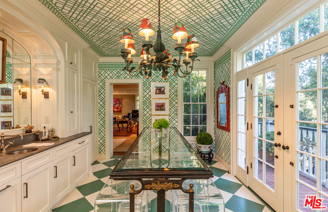 685 Elkins Road Los Angeles, CA 90049 - Photo 5 of 24 a view of living room with a large window