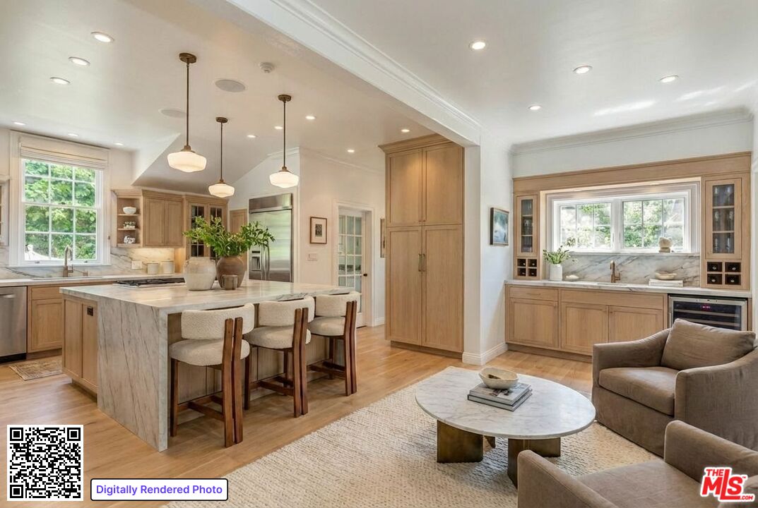 685 Elkins Road Los Angeles, CA 90049 - Photo 8 of 24 a living room with furniture a large window and dining table