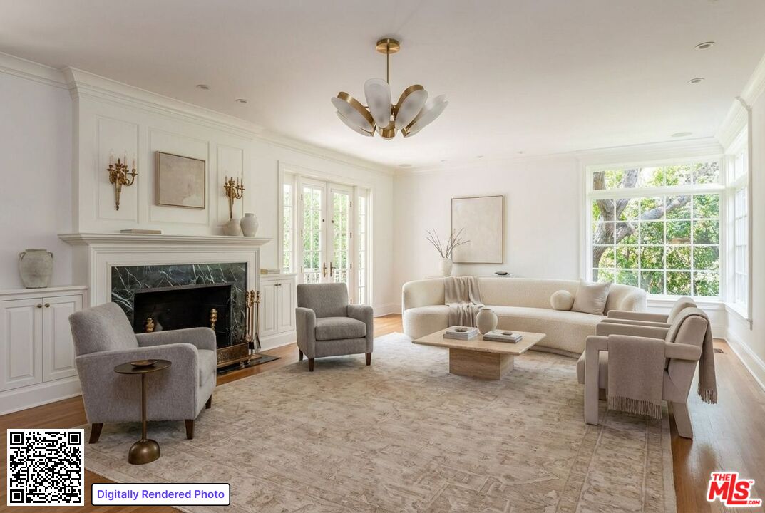685 Elkins Road Los Angeles, CA 90049 - Photo 10 of 24 a living room with furniture and a fireplace