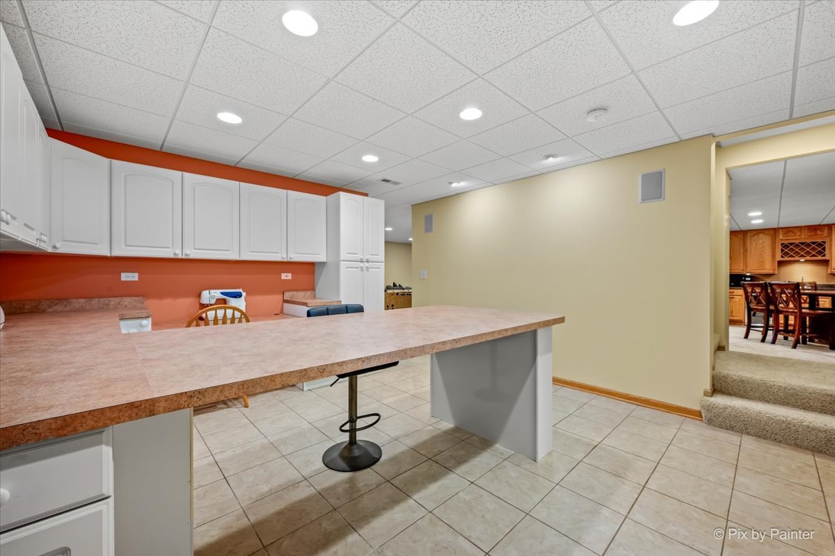 7104 Dove Way Cary, IL 60013 - Photo 54 of 82 a view of a kitchen with a sink and a window