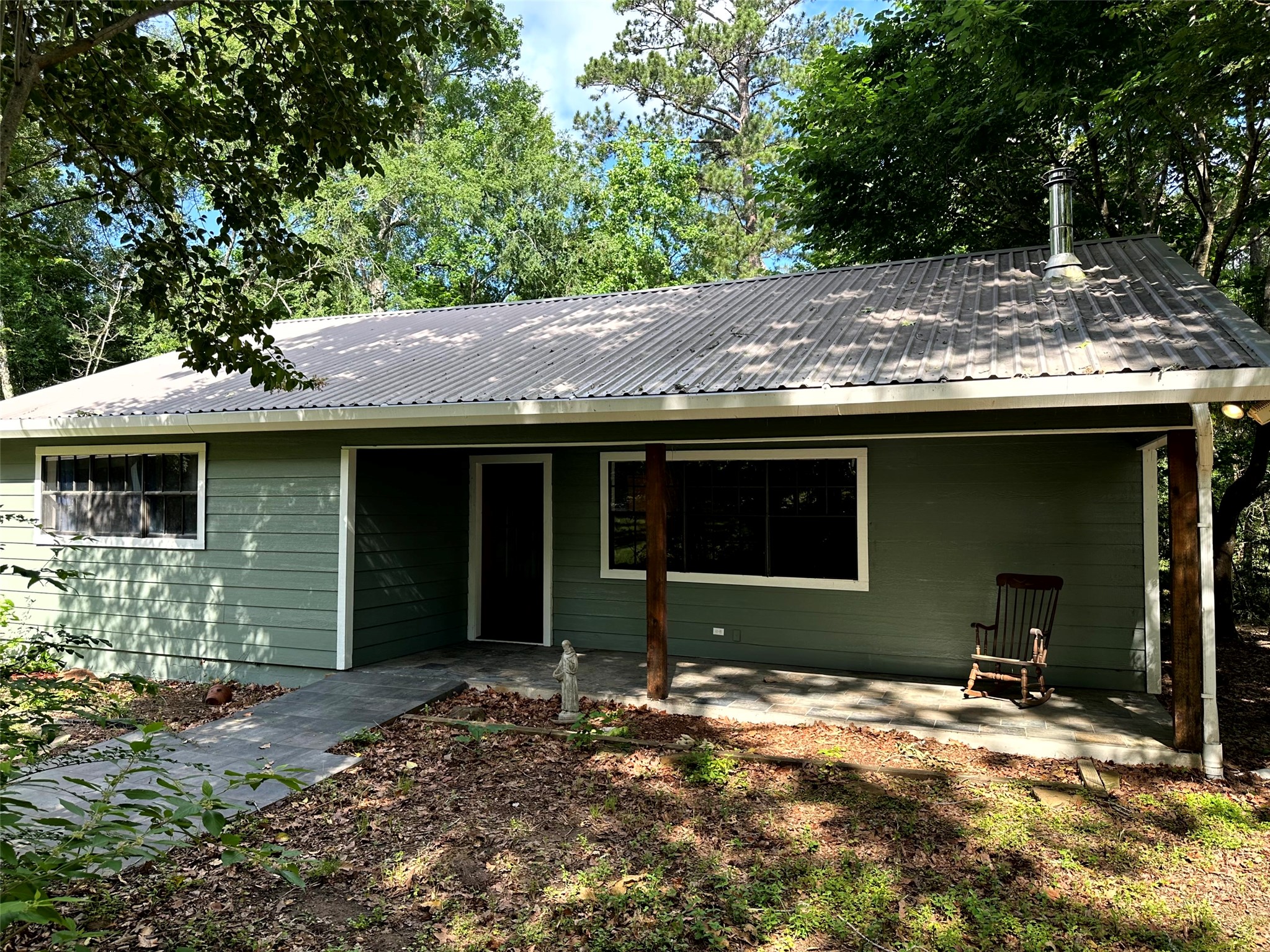 12289 Thompson Road Willis, TX 77318 - Photo 2 of 20 Spacious, covered front porch.