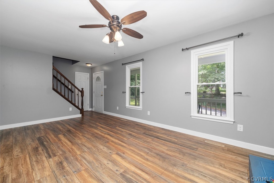 10211 Robbie Road Chesterfield, VA 23832 - Photo 12 of 50 a view of an empty room with wooden floor and a window