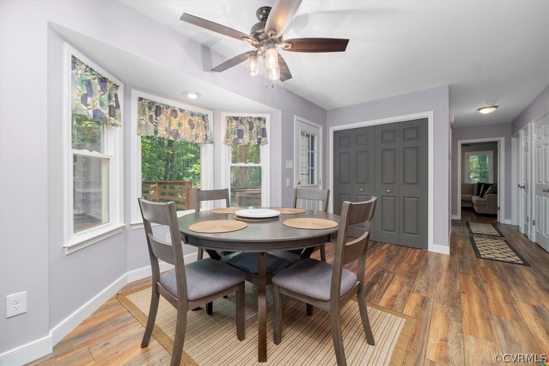 10211 Robbie Road Chesterfield, VA 23832 - Photo 19 of 50 a view of a dining room with furniture window and wooden floor