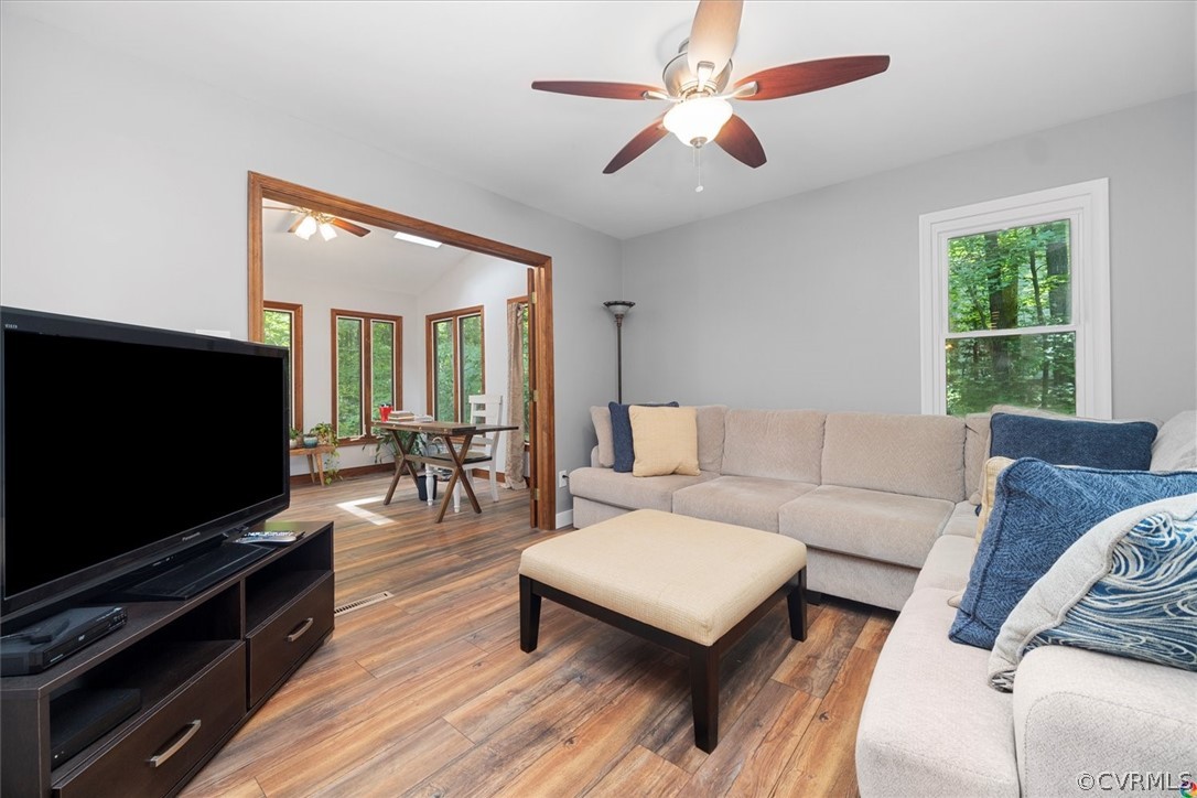 10211 Robbie Road Chesterfield, VA 23832 - Photo 21 of 50 a living room with furniture and a flat screen tv