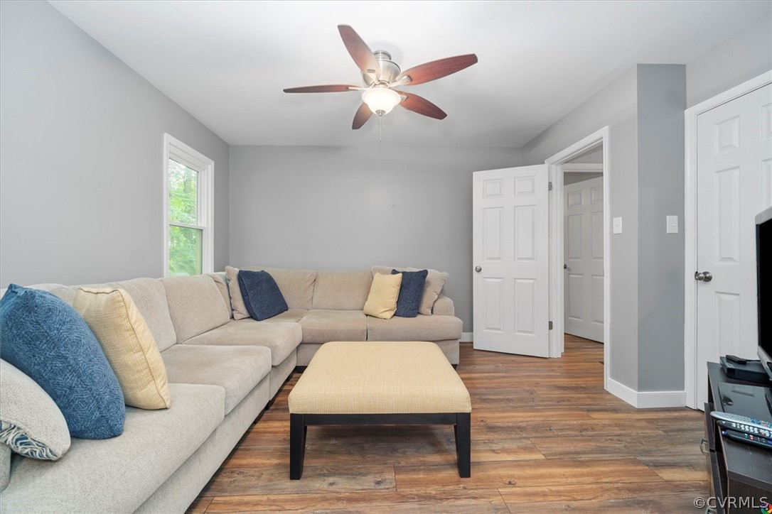 10211 Robbie Road Chesterfield, VA 23832 - Photo 22 of 50 a bed room with a bed and a ceiling fan