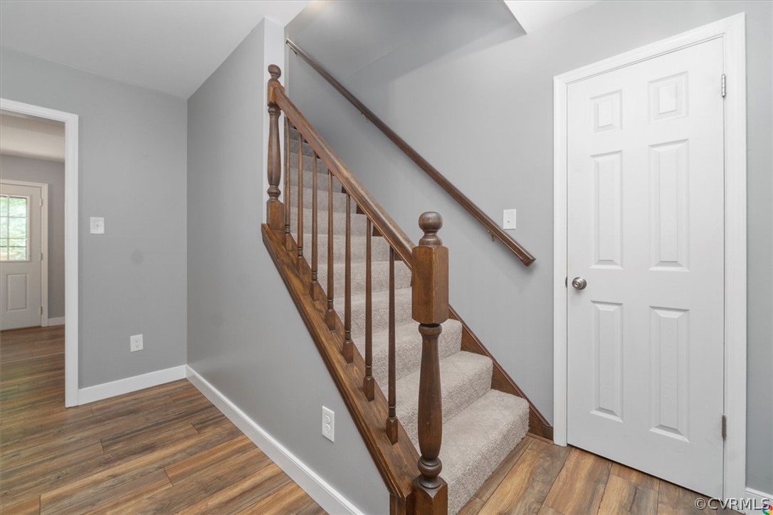 10211 Robbie Road Chesterfield, VA 23832 - Photo 28 of 50 a view of a hallway with wooden floor and entryway