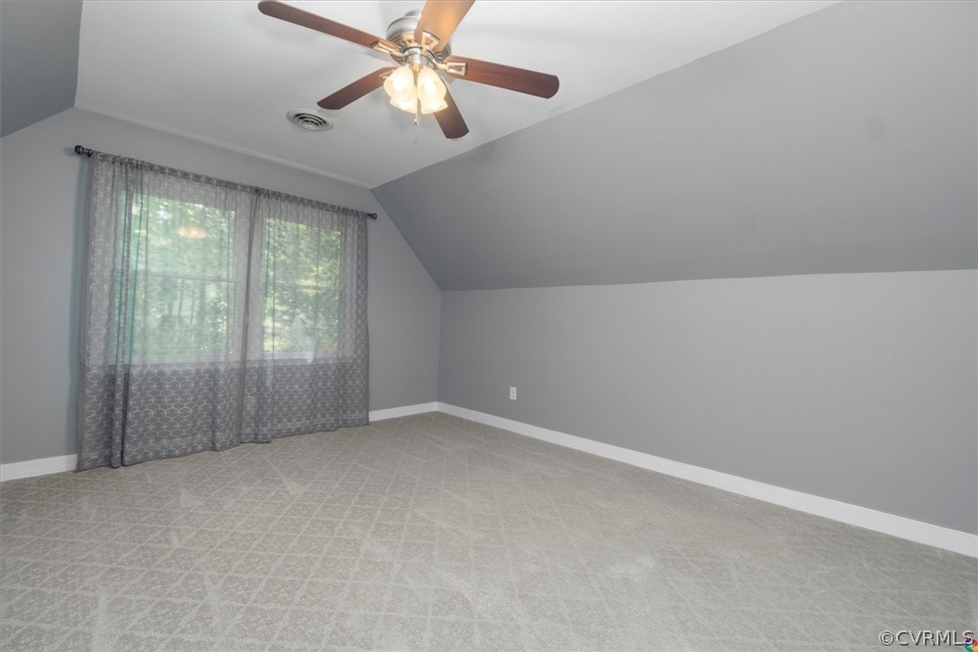10211 Robbie Road Chesterfield, VA 23832 - Photo 31 of 50 an empty room with a window and a fan