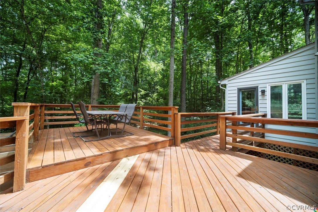 10211 Robbie Road Chesterfield, VA 23832 - Photo 42 of 50 a view of balcony with outdoor seating and wooden floor