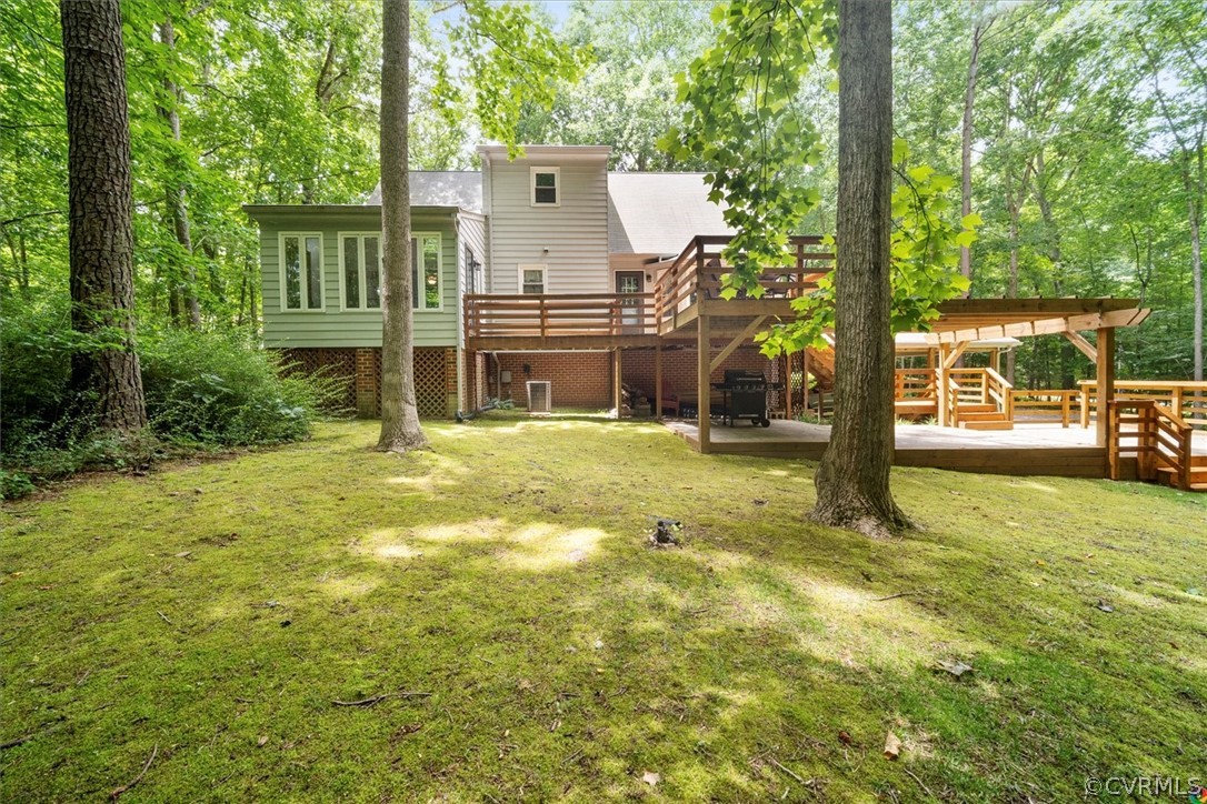 10211 Robbie Road Chesterfield, VA 23832 - Photo 47 of 50 a view of a house with pool and sitting area