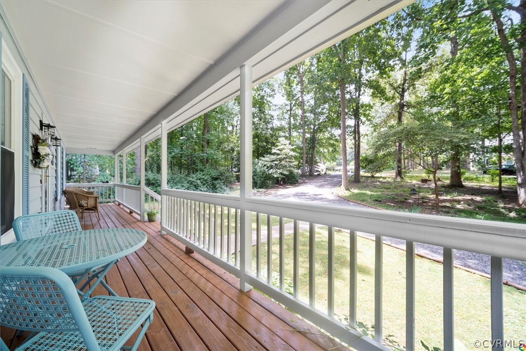 10211 Robbie Road Chesterfield, VA 23832 - Photo 7 of 50 a view of balcony with couch and wooden floor
