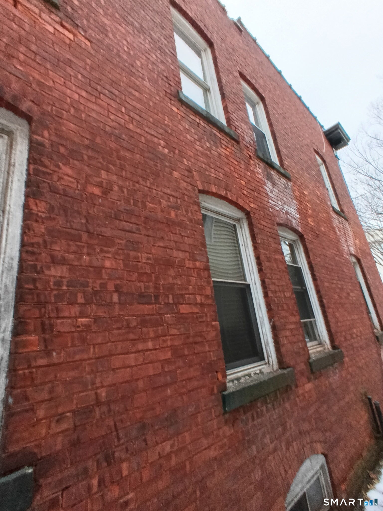 46 Shepard Street New Haven, CT 06511 - Photo 3 of 6 a brick building with a door