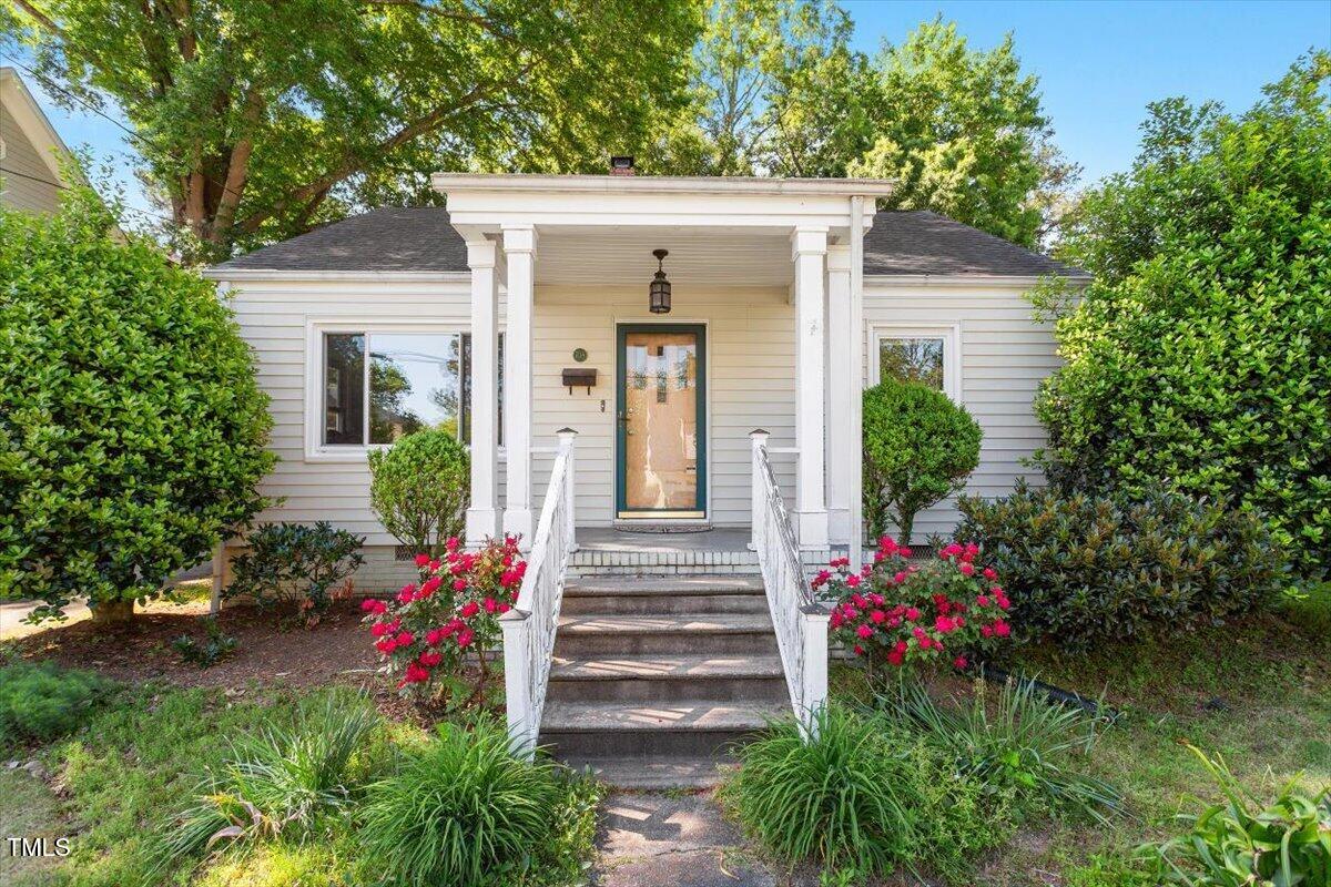 708 Mills Street Raleigh, NC 27608 - Photo 3 of 39 a front view of a house with a yard