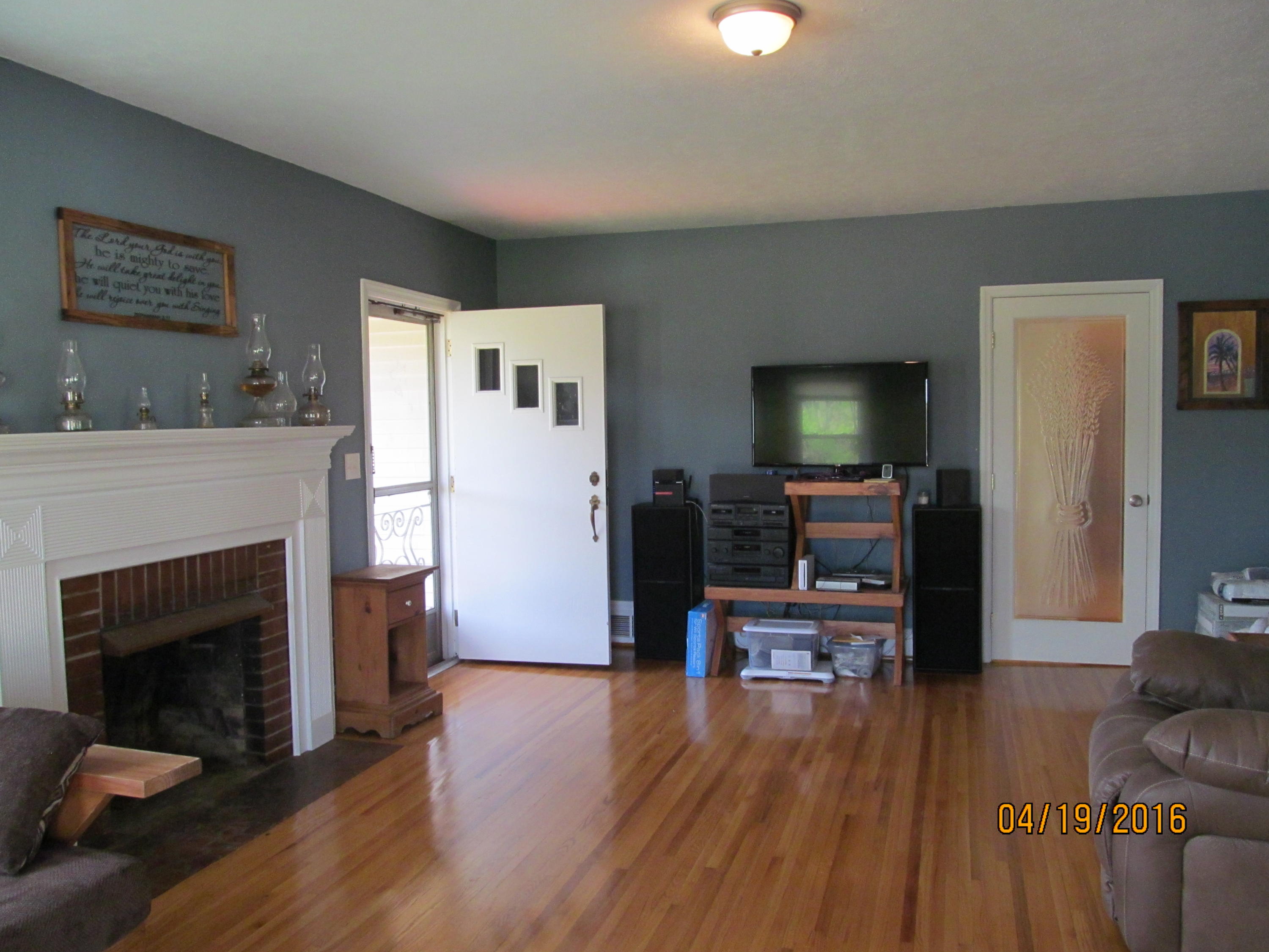 59 Whetstone Road Ferrum, VA 24088 - Photo 12 of 65 a living room with furniture and a fireplace