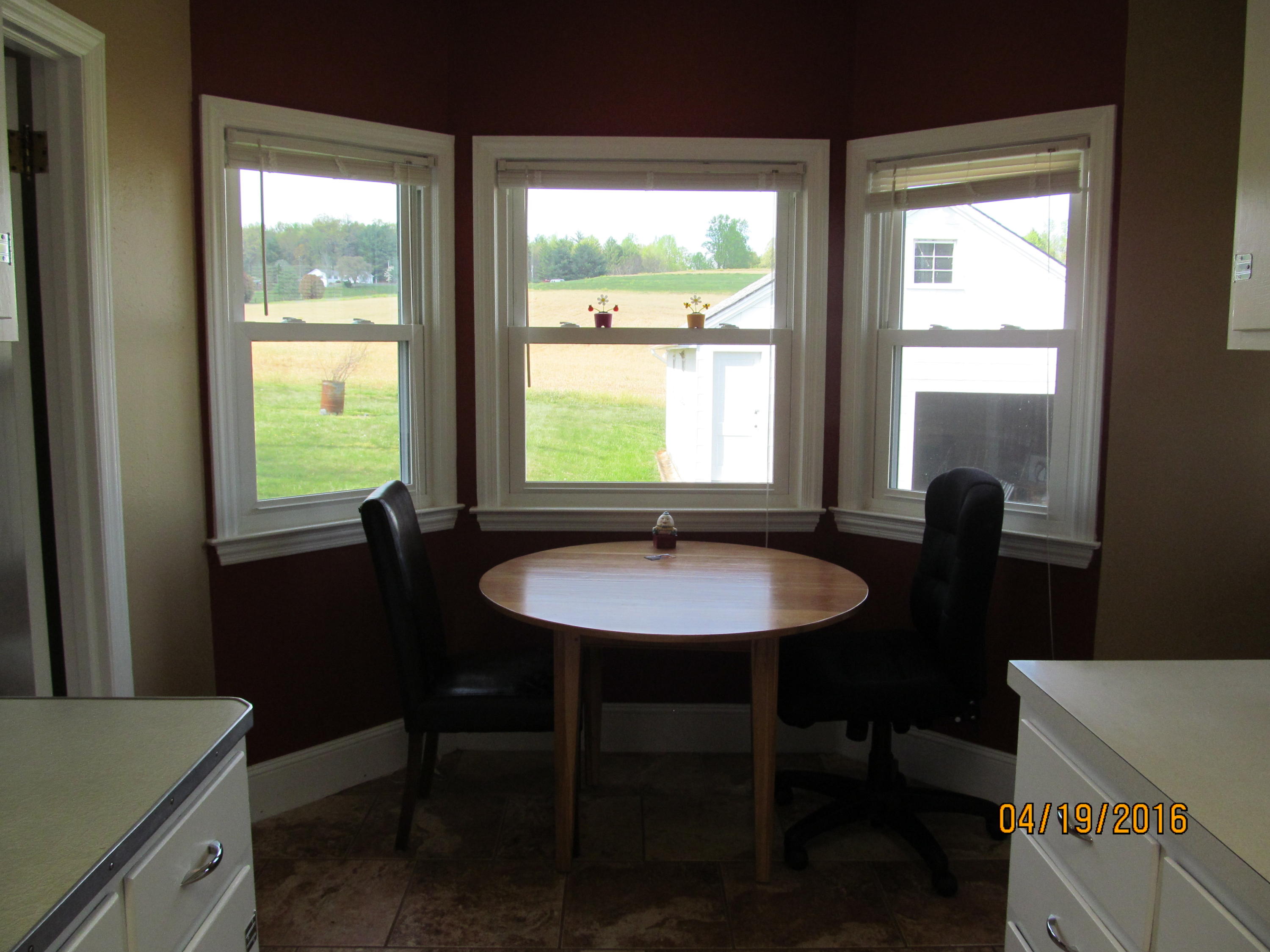 59 Whetstone Road Ferrum, VA 24088 - Photo 19 of 65 a view of a dining room with a table and chairs