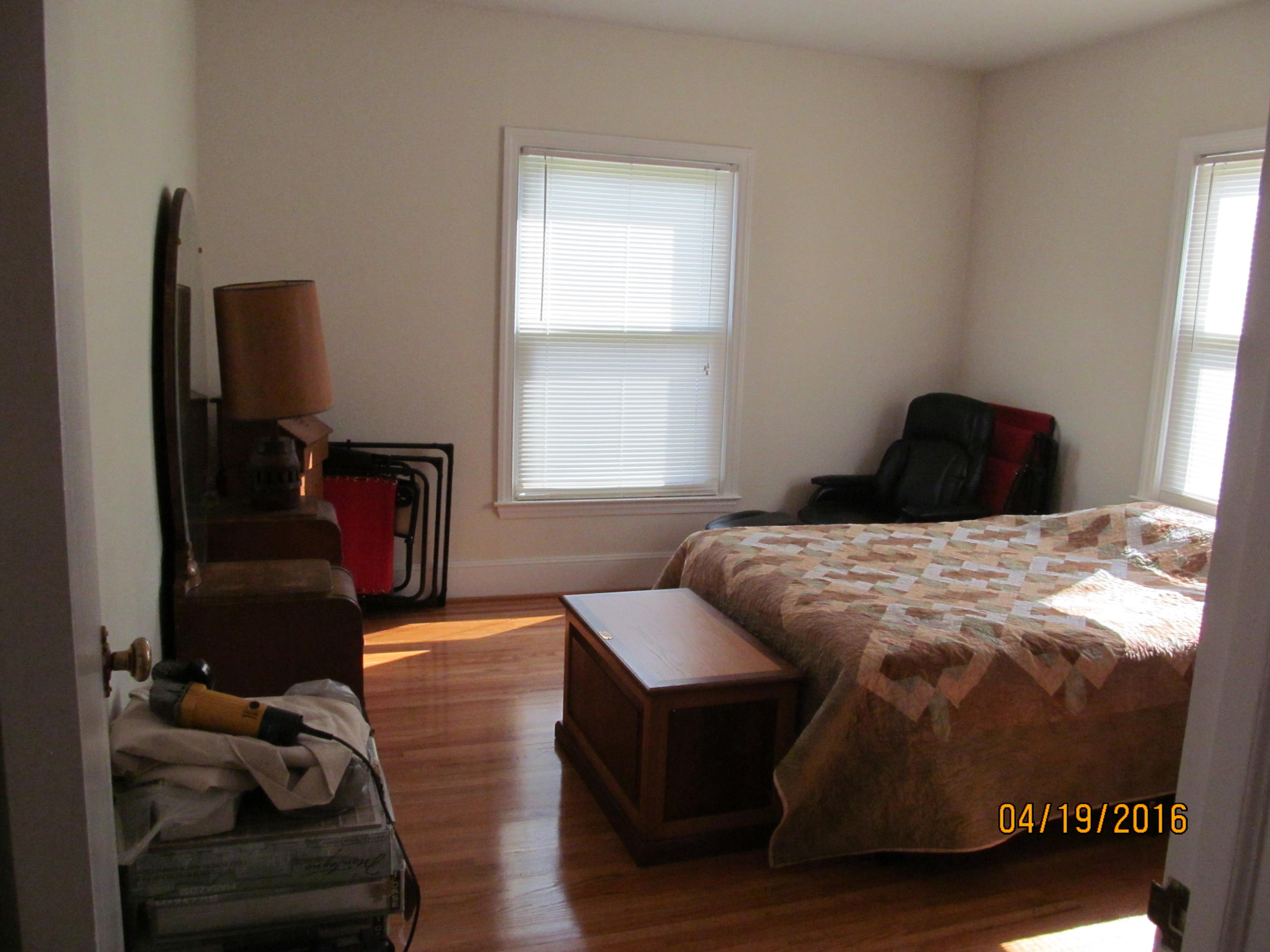 59 Whetstone Road Ferrum, VA 24088 - Photo 20 of 65 a bedroom with a bed and a chair