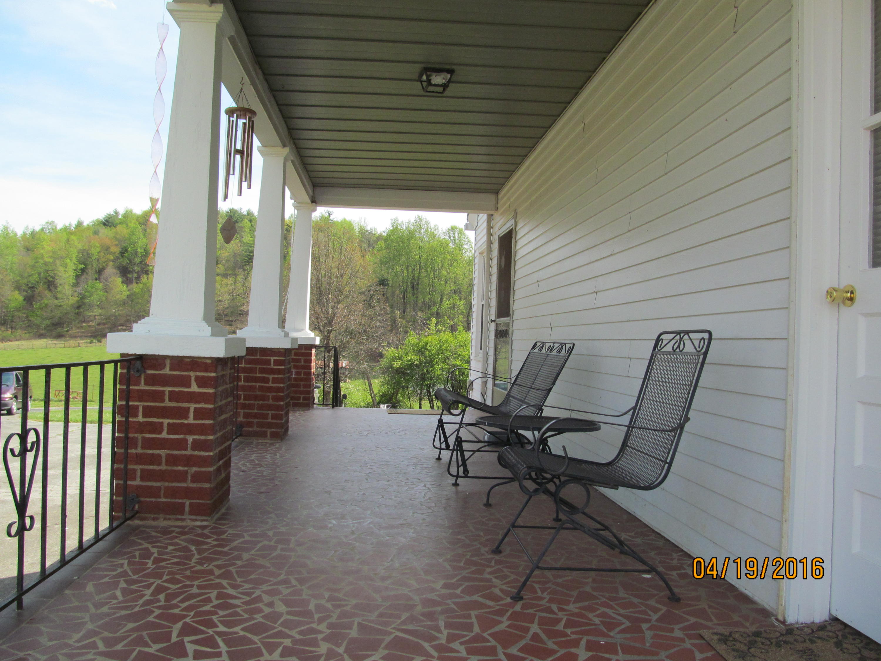 59 Whetstone Road Ferrum, VA 24088 - Photo 4 of 65 a view of two chairs in the balcony