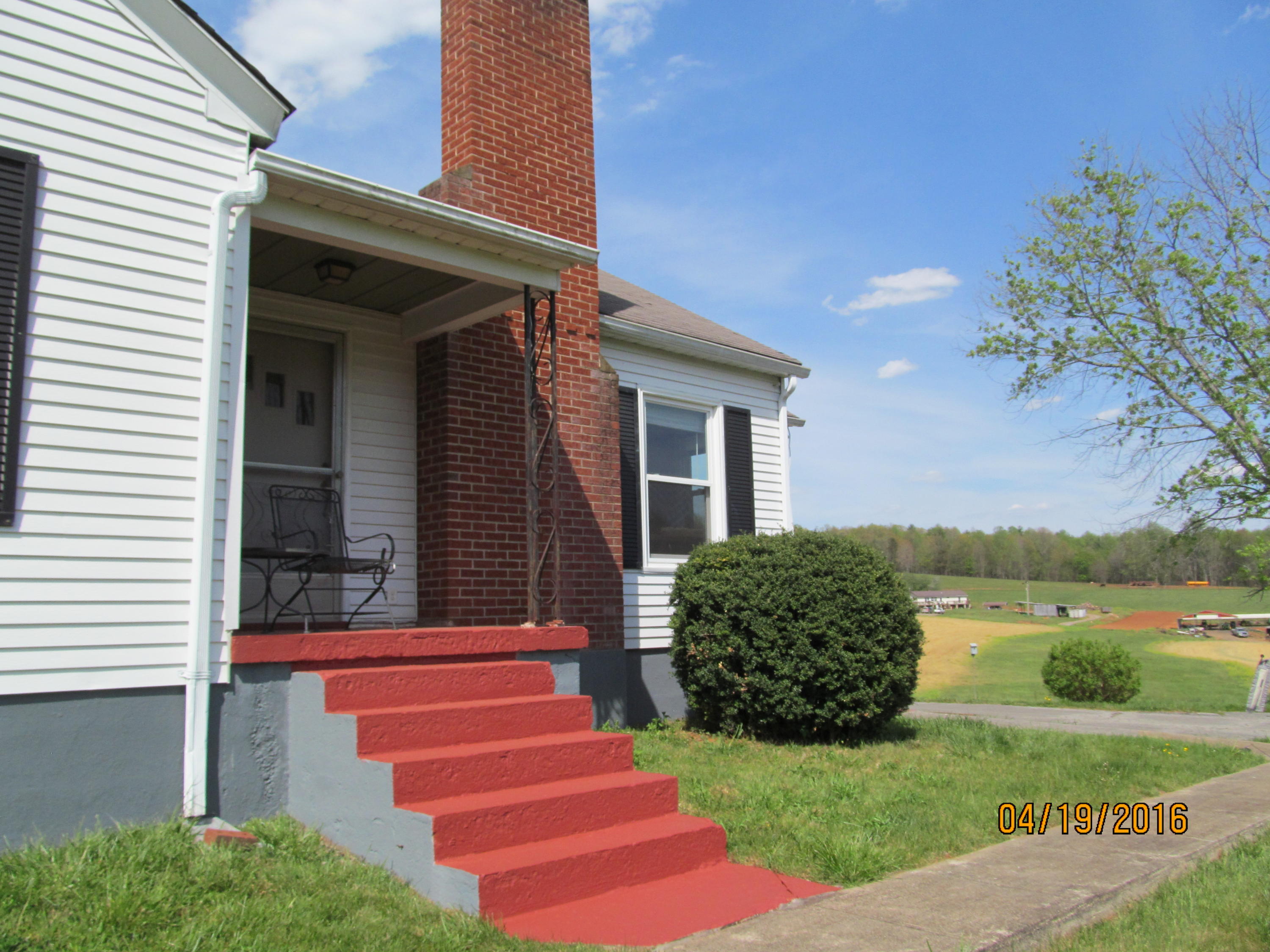 59 Whetstone Road Ferrum, VA 24088 - Photo 48 of 65 a front view of a house with a yard