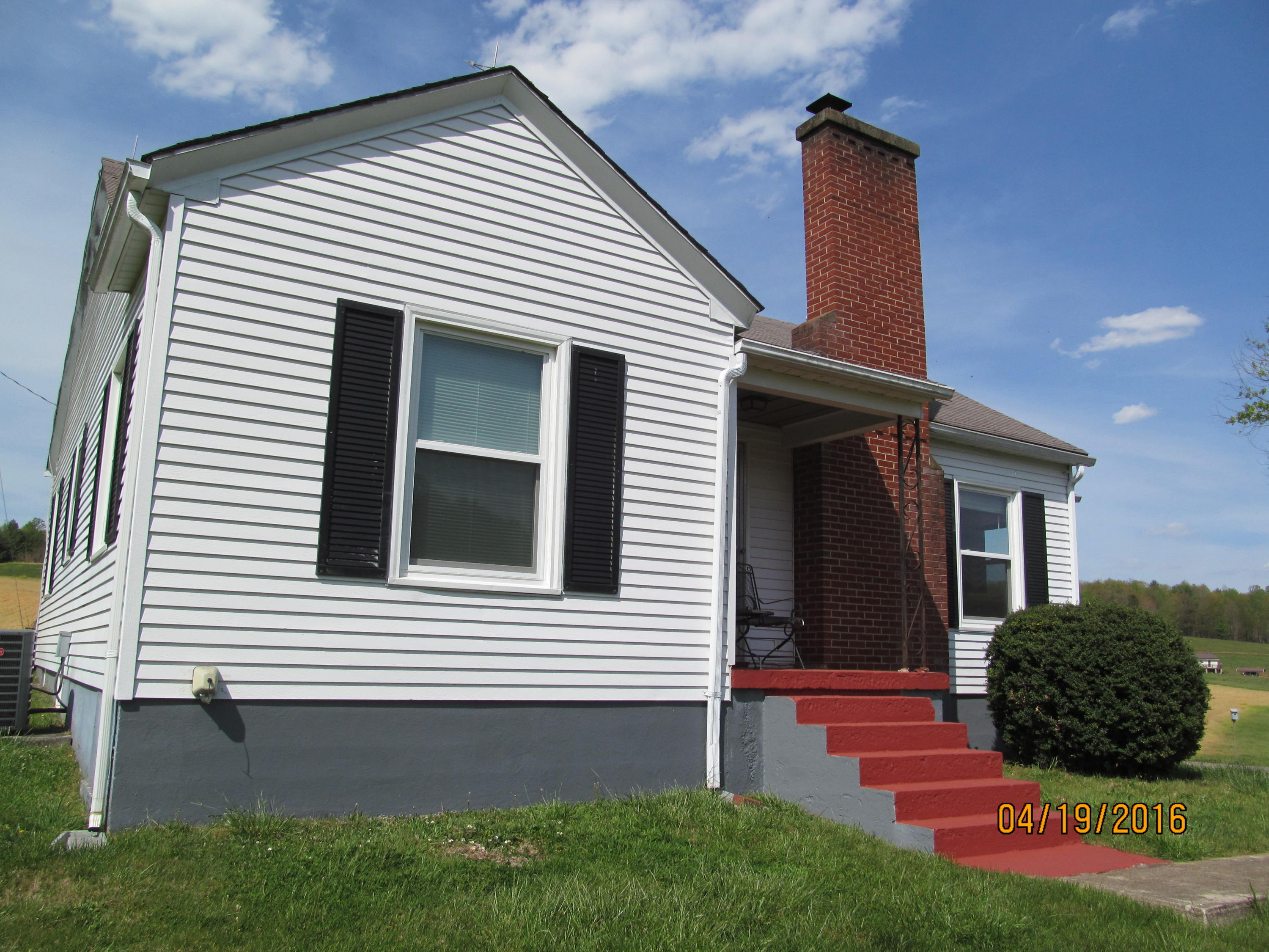 59 Whetstone Road Ferrum, VA 24088 - Photo 49 of 65 a view of a house with a yard and plants