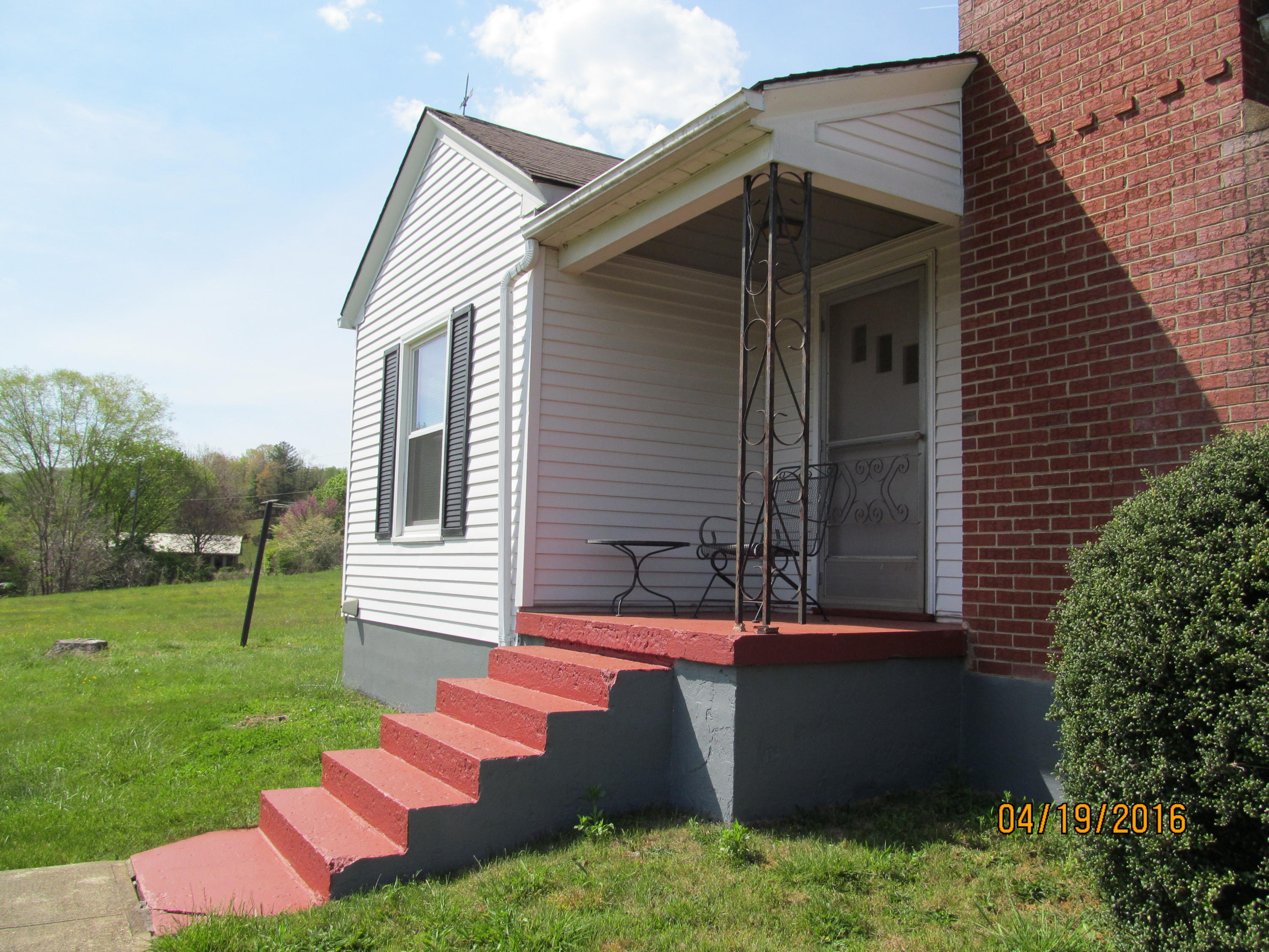 59 Whetstone Road Ferrum, VA 24088 - Photo 50 of 65 a front view of a house with a yard