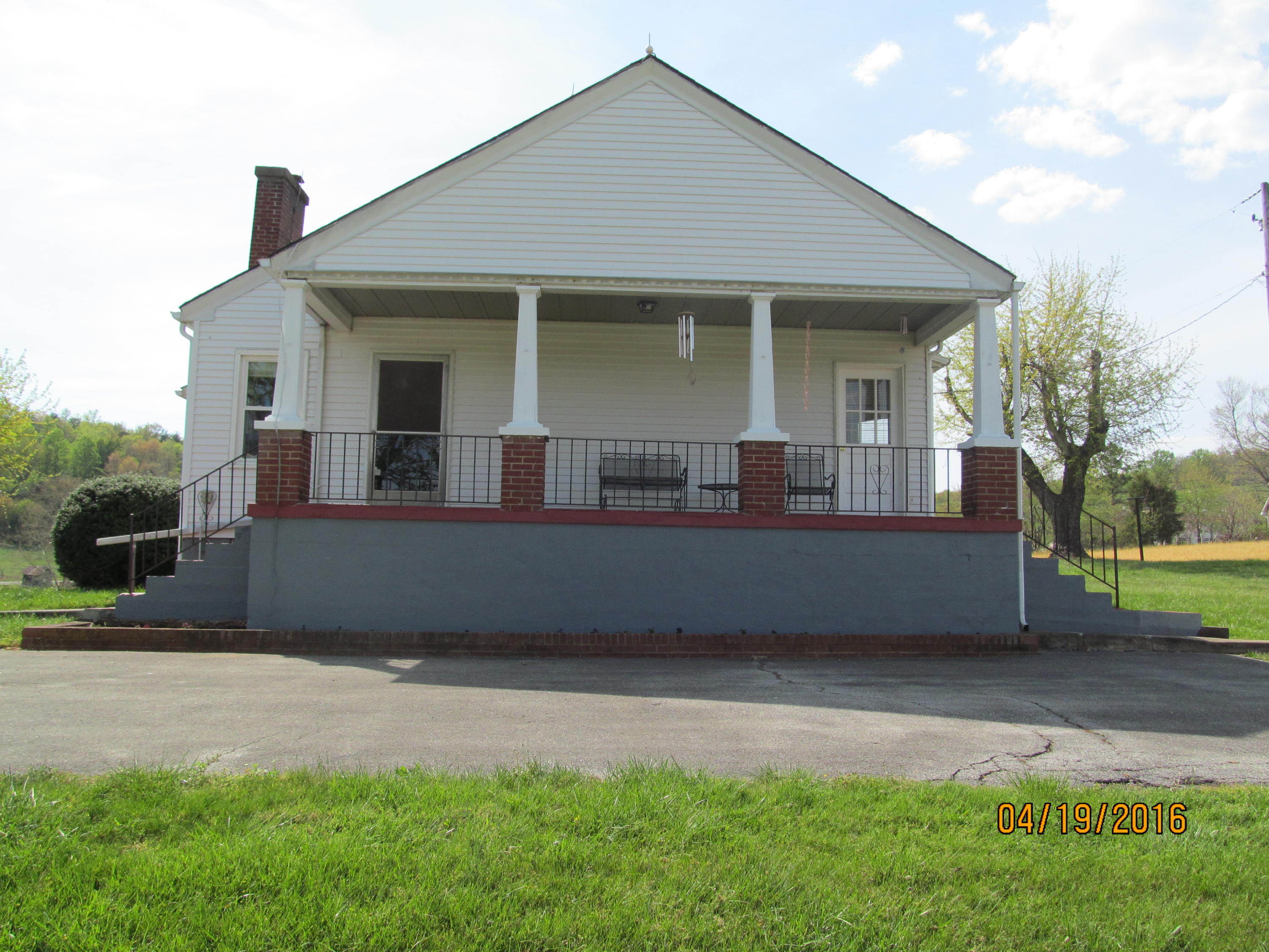 59 Whetstone Road Ferrum, VA 24088 - Photo 51 of 65 a front view of a house with a garden