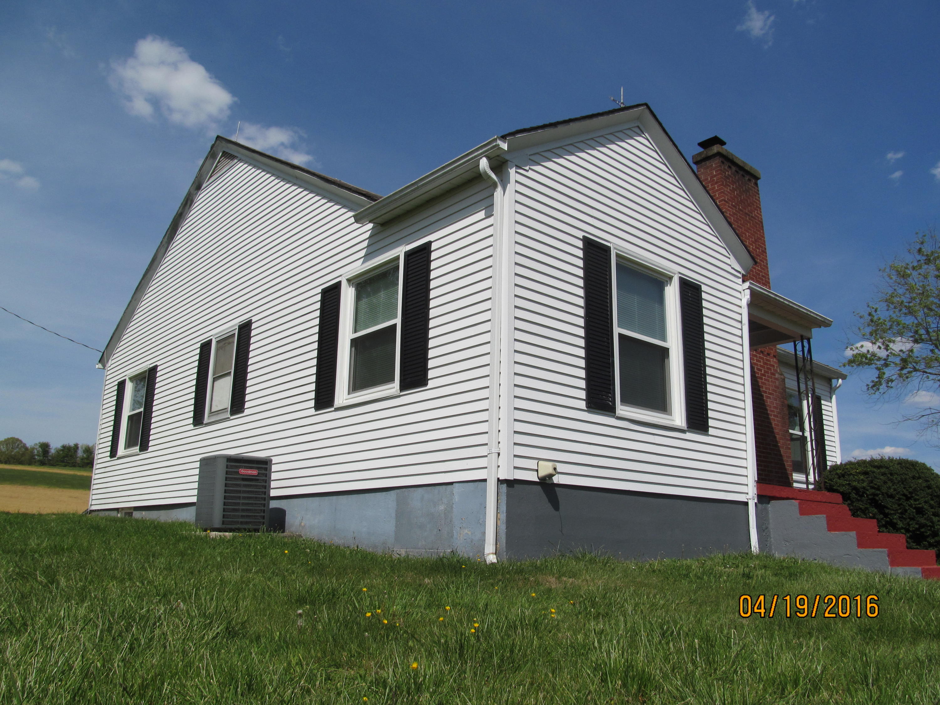 59 Whetstone Road Ferrum, VA 24088 - Photo 7 of 65 a front view of a house with a yard