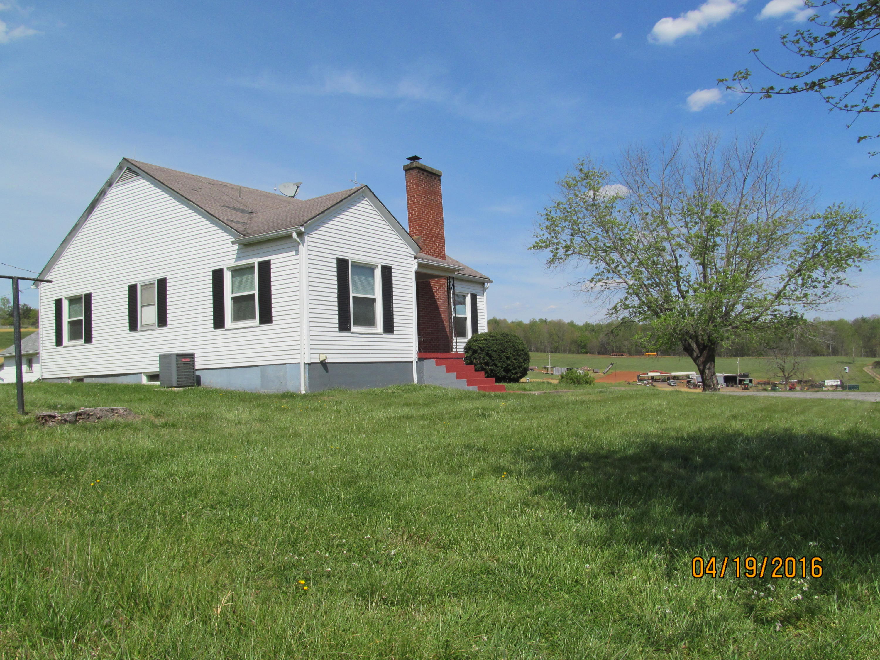 59 Whetstone Road Ferrum, VA 24088 - Photo 8 of 65 a front view of a house with a garden