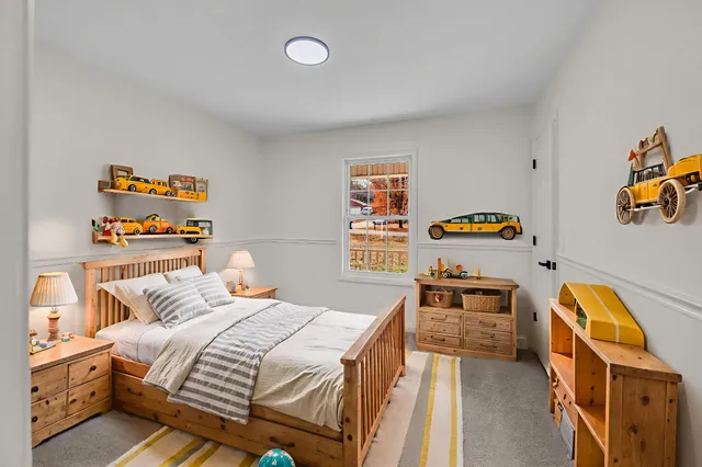 a bedroom with a bed and a closet