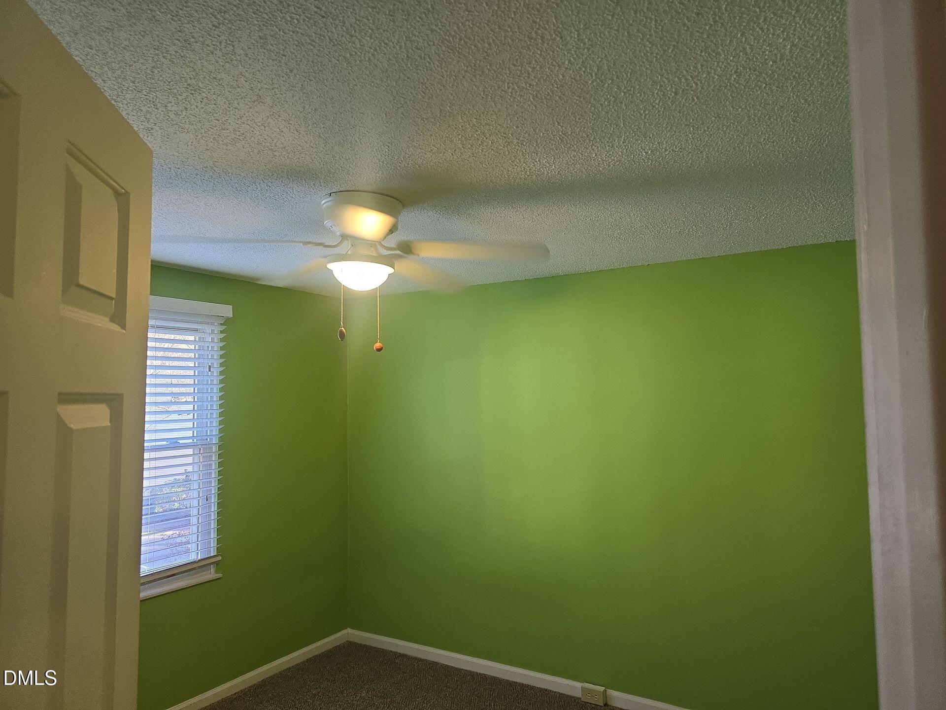 7825 Stephanie Lane Raleigh, NC 27615 - Photo 16 of 20 a view of a small space with a window