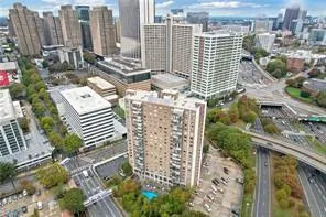 a view of a city with tall buildings