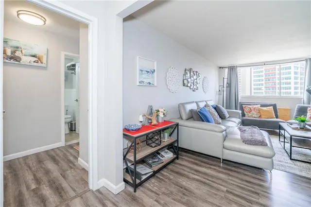 a bedroom with furniture and a window