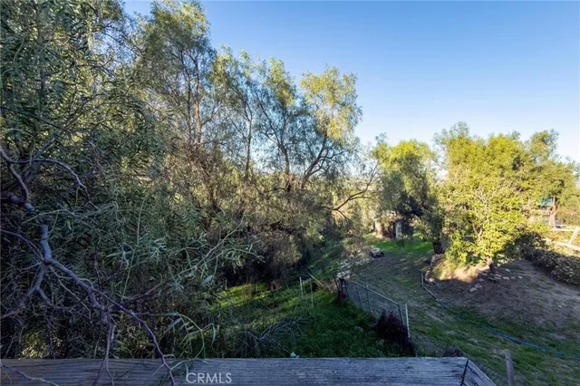a view of an empty room with stairs
