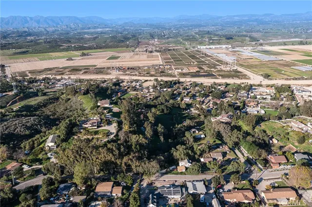 a view of a city with mountains in the background
