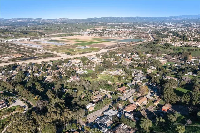 a view of a city with mountains in the background