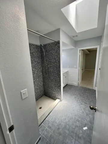 a view of an empty walk in closet